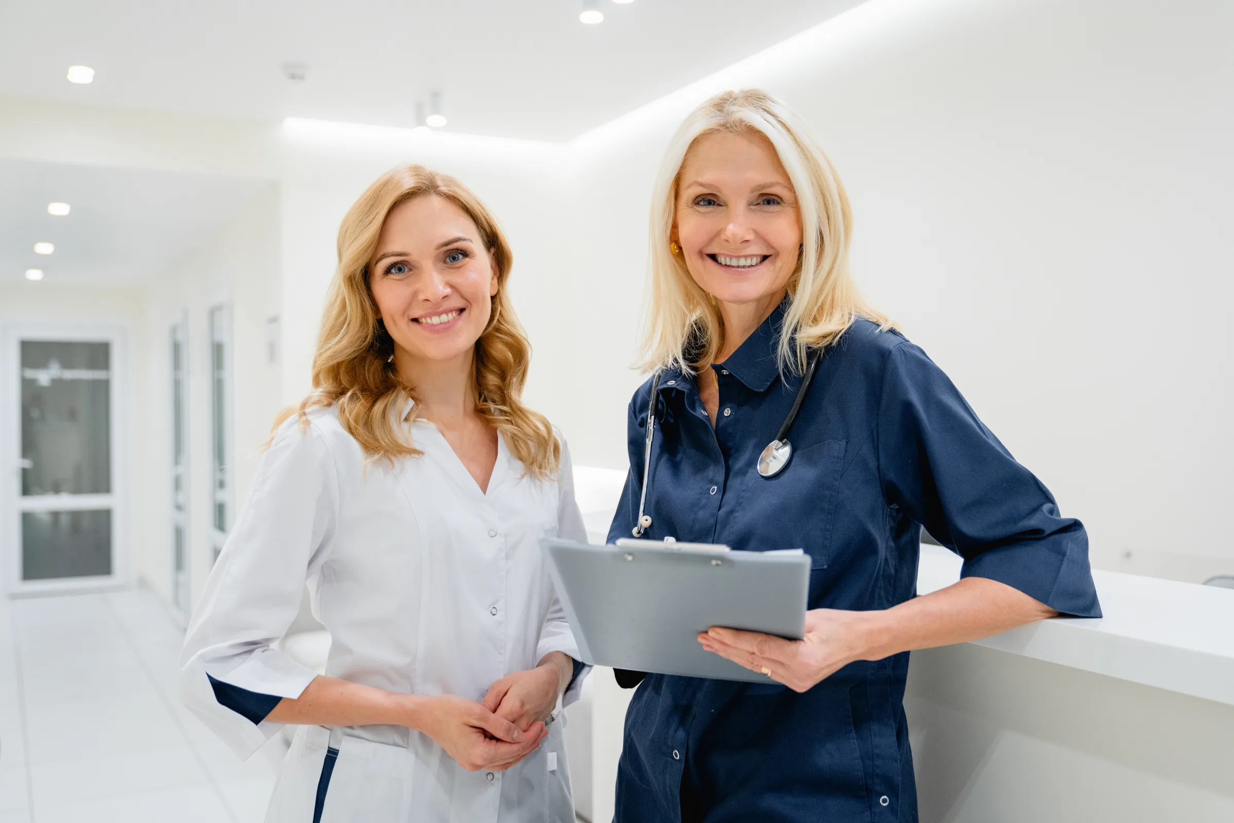 A physician sitting with a patient, talking through a diagnosis